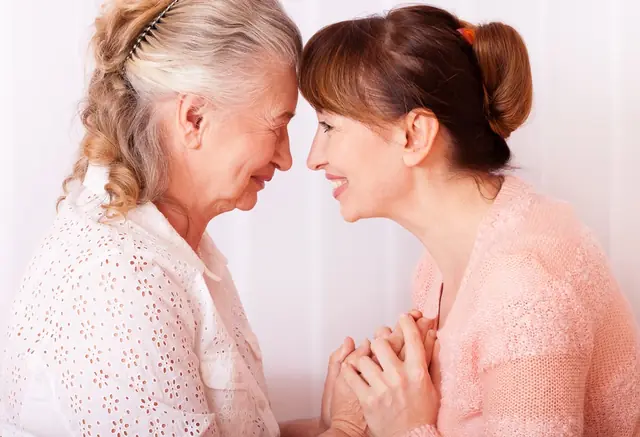 Senior Lady With Her Caregiver 640